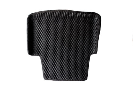 Black car mat made of high quality rubber on a white background, close-up, comfortableの写真素材