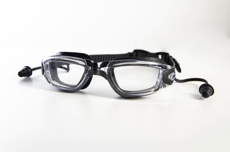 Transparent swimming goggles on a white backgroundの写真素材