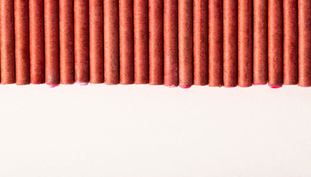 A bunch of firecrackers with red sulfur. Set of pyrotechnics, explosion hazard.