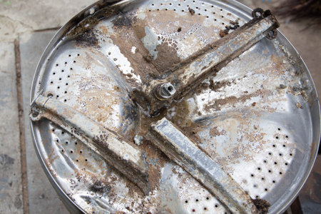 Breakage of the metal cross in the washing machine and non-separable drum. Fault in washing machines.の写真素材