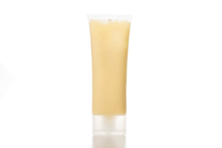 Yellow tube on white background, isolateの写真素材
