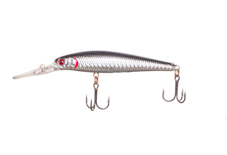 silver fishing lure on white background, isolate, close-upの写真素材