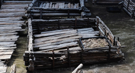 Ancient historical excavations in a museum with wooden village houses. Historical excavationsの写真素材