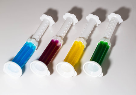 A set of multi-colored syringes with different scents for cleaning and disinfection. Hygiene and antibacterial effectの写真素材