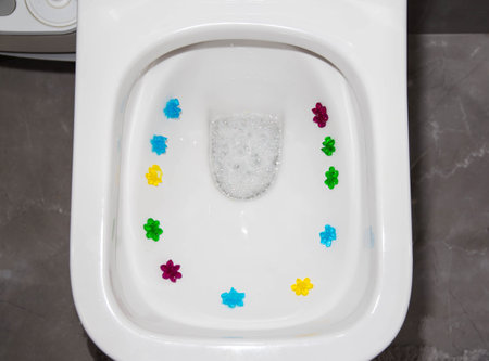 Multi-colored flowers in the toilet with different smells. Antibacterial and cleansing effectの写真素材