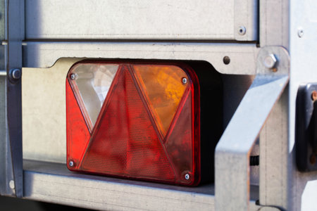 Electric turn signal, brake light and side lights on galvanized trailer