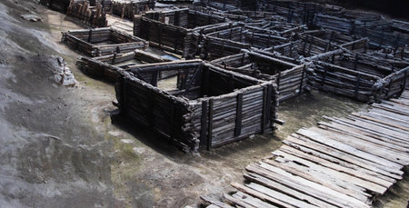Ancient historical excavations in a museum with wooden village houses. Historical excavationsの写真素材