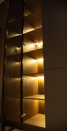 Custom cabinet with LED strip in shelves, beautiful design, technologyの写真素材