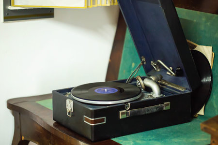 Retro gramophone device for playing records, close-up. Copy space for text
