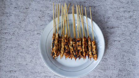 A close-up shot of freshly made arrosticini satay in a studio setting, conveying the freshness and flavour of the food.の写真素材