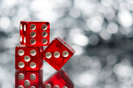 Red Sic Bo dice with sparkling backgroundの写真素材