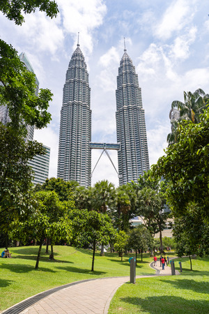 KLCC area of Kuala Lumpur - Malaysia. September 1 - 2017: The Petronas Towers which also known as the Petronas Twin Towers, are the famous twin skyscrapers in Kuala Lumpur of Malaysiaのeditorial素材