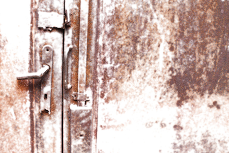 Artistic Diffused Glow Background Rusty Door Panelの写真素材