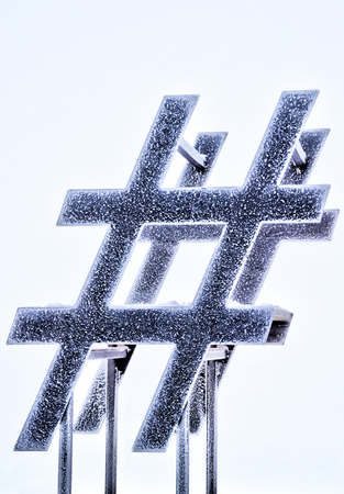 Metal Hashtag in snowの写真素材