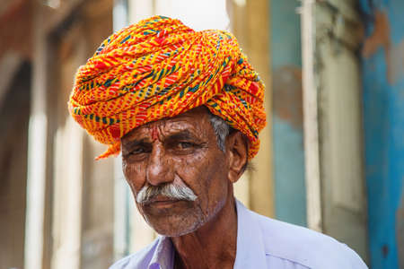 Jodhpur, Rajasthan, India - February 23, 2015: Portrait of an old man in the streets of Jodhpur with a traditional turbanのeditorial素材
