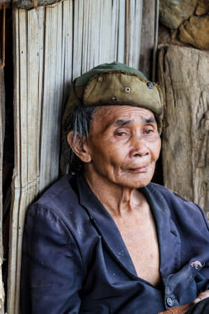 Tam Duong, North Vietnam - Portrait of a man from the Red Hmong mountain tribe