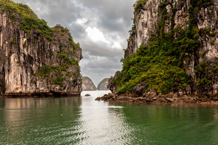 Halong Bay, Vietnam. View from a boat in the bay of Halong. In the bay are thousands of islands of limestone with beautiful shapes.の写真素材