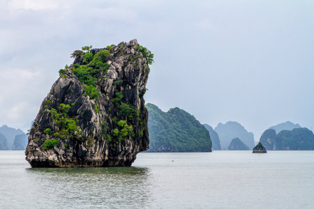 Halong Bay, Vietnam. View from a boat in the bay of Halong. In the bay are thousands of islands of limestone with beautiful shapes.の写真素材