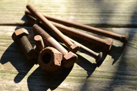 rusty bolts, screws and nutsの写真素材