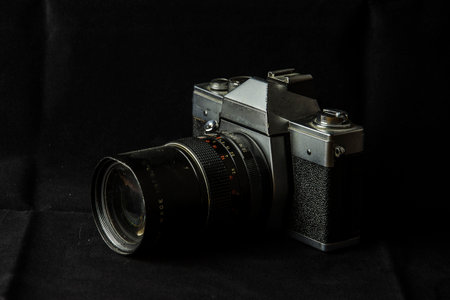 Vintage Camera on a Black Background. Retro Camera. Old Camera.の写真素材