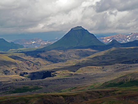 view on mountain Hattafell in thorsmork national park in iceland  - strange shaped green  mountain with Landmanallaugar - rainbow mountain backgroundの写真素材