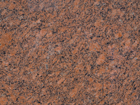 polished red and black stone facade texture - marble abstract backgroundの写真素材