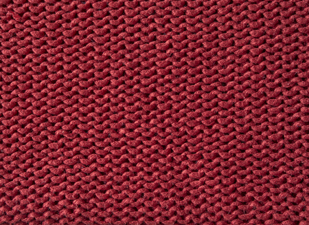 red wool knitted fabric texture abstract background