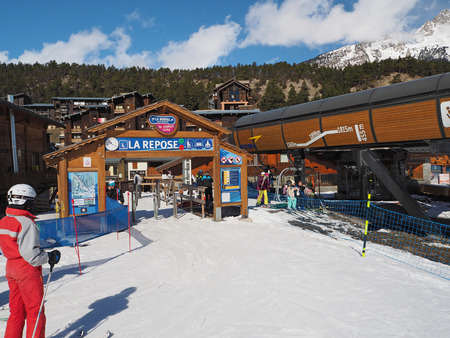 LA NORMA, FRANCE,  MARCH 5, 2017: People using ski lift La Repose in sky resort La Norma Savoyan...