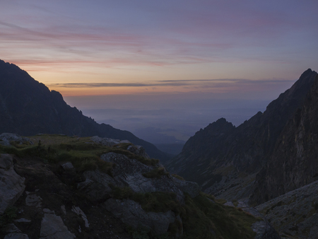 Orange Sunset or sunrise sk, view form teryho chata cabin to valley, High Tatras mountains, Slovakia.の写真素材