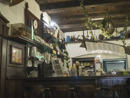 Beroun, Czech Republic, March 23, 2019: Interior of old rustic traditional brewery pub called Berounsky medved in central Bohemian with relaxing peopleのeditorial素材