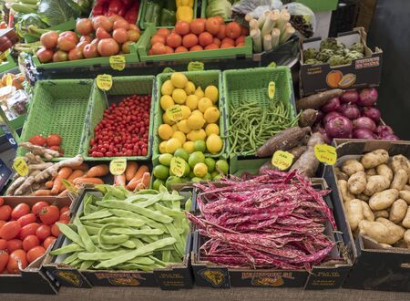 Santa Cruz de la Palma, La Palma, Canary Islands, Spain, December 23, 2019: fruit and vegetable stand in market hall with colorful boxes full of tropical fruitのeditorial素材