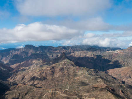 Amazing view from Roque Nublo plateau on central volcanic mountains with Caldera and Barranco de Tejeda and Roque Bentayg rock. Gran Canaria, Canary Islands, Spain.の写真素材