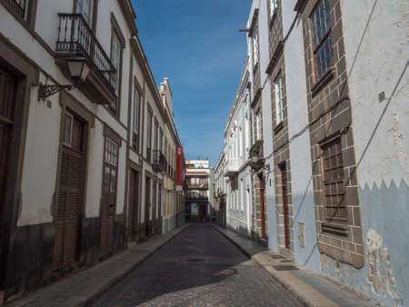 Las Palmas de Gran Canaria, Canary Islands, Spain December 23, 2020: Street at old town Vegueta with historic buildings with colorful facades and traditional colonial architectureのeditorial素材