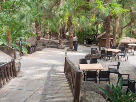 San Bartolome de Tirajana, Gran Canaria, Canary Islands, Spain December 18, 2020: Empty restaurant with tables and chairs at Palmitos Park, Area is closed due to covid pandemicのeditorial素材