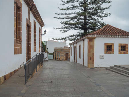 Teror, Gran Canaria, Canary Islands, Spain December 21, 2020: Street at center of historic town Teror, traditional spanish colonial architectureのeditorial素材