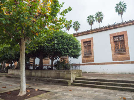 Teror, Gran Canaria, Canary Islands, Spain December 21, 2020: View of small courtyard garden in center of historic town Teror, traditional spanish colonial architectureのeditorial素材