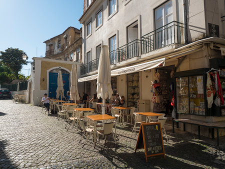 Lisbon, Portugal, October 24, 2021: View of Lisbon street leading to Castelo de sao Jorge at medieval quarter Alfama.のeditorial素材