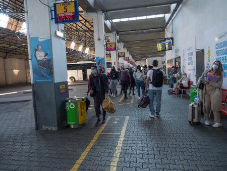 Lisbon, Portugal, October 24, 2021: Passengers waiting for the bus on platform of Sete Rios Bus...