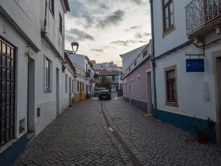 Odeceixe, Odemira, Portugal, October 28, 2021: Paved street at village Odeceixe with old white houses in traditional Portuguese styleのeditorial素材
