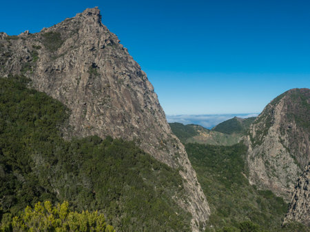 Scenic view from the Mirador de Roque Agando with volcanic rock formation mountains Roque de Zarcita and Roque de Ojila in Garajonay National Park on La Gomera, Canary Islands, Spain, Europe.の写真素材