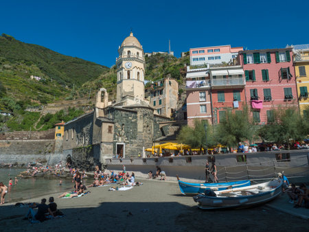Vernazza, National park Cinque Terre, Liguria, Italy, September 25, 2023: Old harbor of Riomaggiore with wooden boats, ships, and colorful historical houses. Streets crowded with tourist peopleのeditorial素材