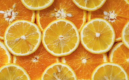 orange and lemon cut into circlesの写真素材