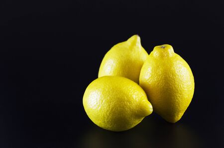 lemons on a black backgroundの写真素材