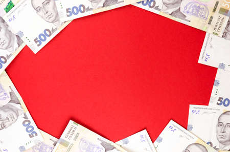Five hundred Ukrainian hryvnia on an red backgroundの写真素材