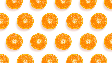 Pattern of cut tangerines on a white backgroundの写真素材