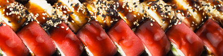 Japanese food, set rolls in king prawn, rolls in smoked eel with unagi sauce and Philadelphia rolls with salmon 3の写真素材