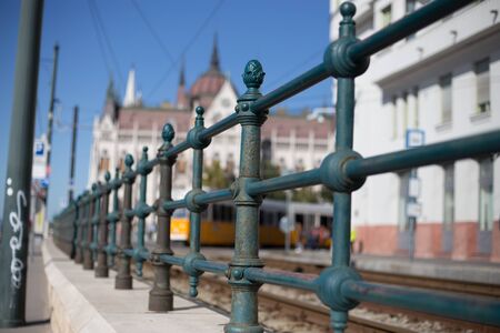 Old metal fence in the city centerの写真素材
