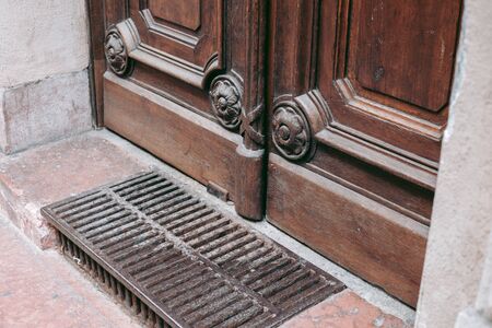 Old wooden door with carvings