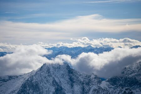 High alpine mountains with snow in Germany and blue beautiful sky