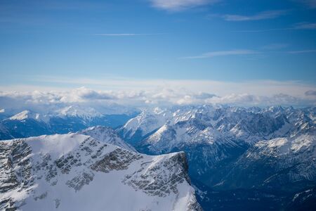 High alpine mountains with snow in Germany and blue beautiful sky